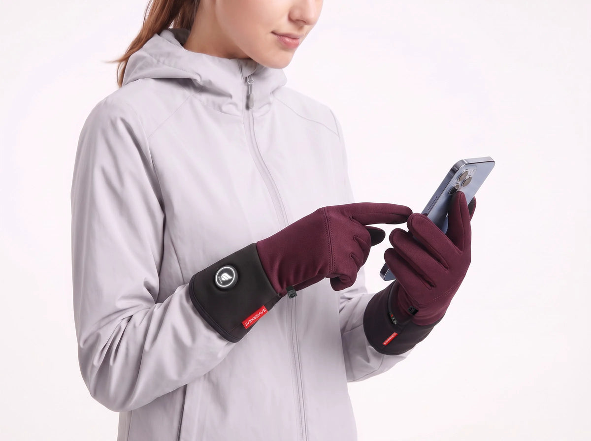 Touchscreen-compatible Savior Heat lightweight heated glove liners for convenient phone use outdoors