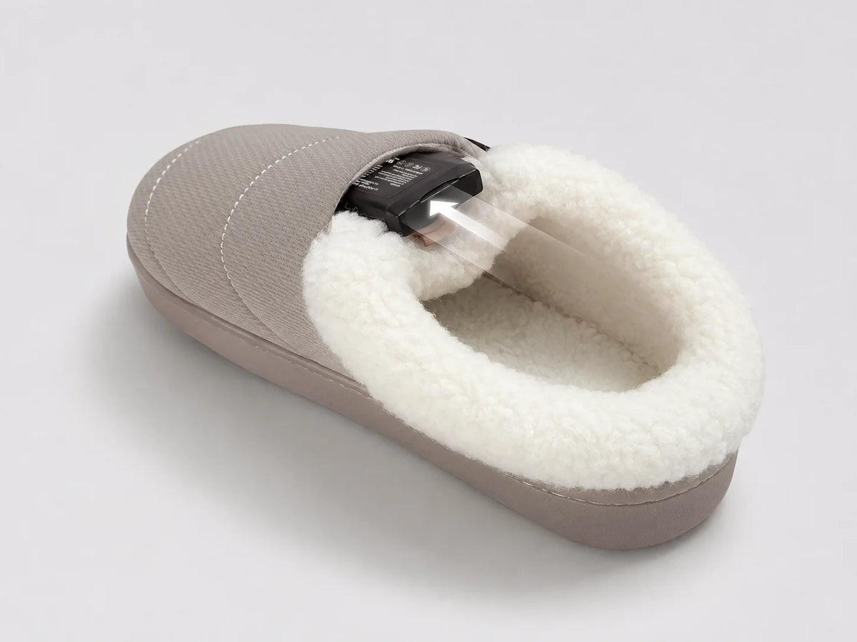 Savior Heat adjustable-cuff heated slippers with a concealed battery pocket for a cleaner fit